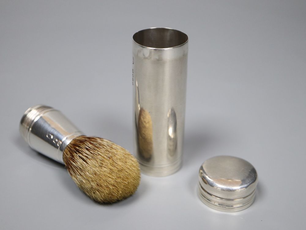 A Victorian silver cylindrical cased travelling shaving brush, Thomas Johnson I, London, 1869, 75mm (